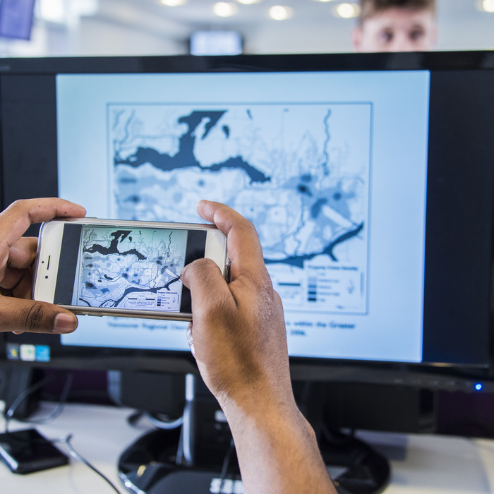 images of someone photographing a computer monitor